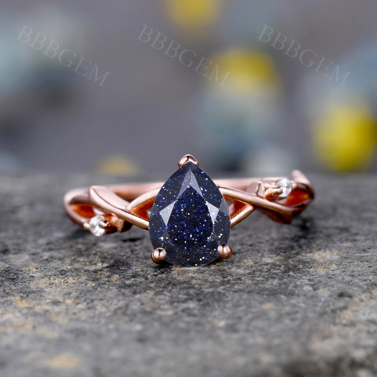 1.25ct Pear Cut Galaxy Blue Sandstone Wedding Ring In Pink Gold Twist Diamond Wedding Band