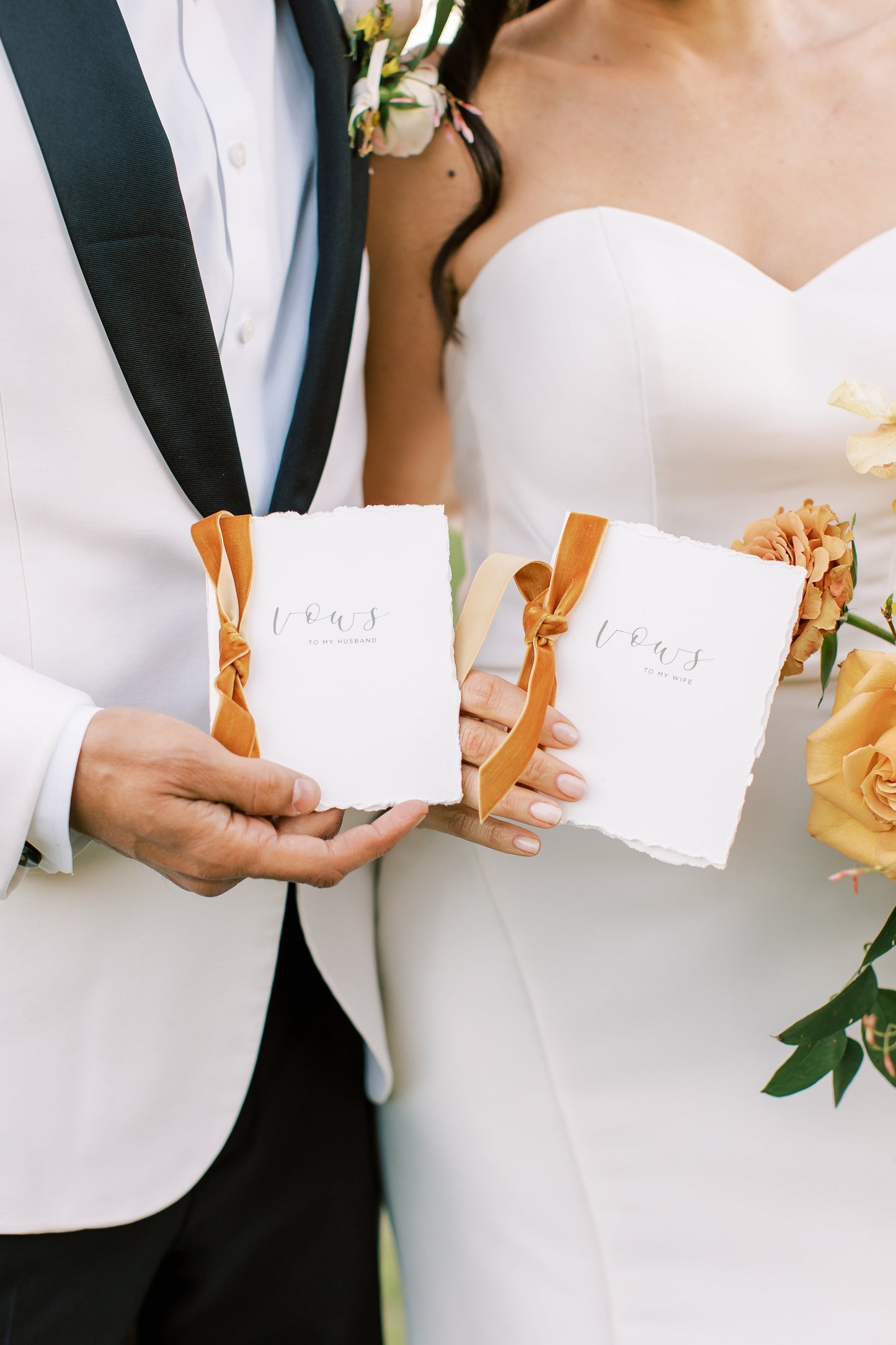 Handmade Vow Books with velvet ribbon