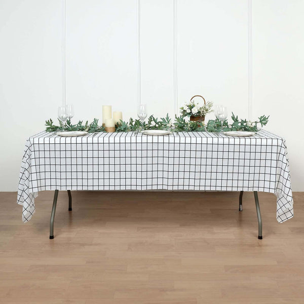 5 Black and White 54x108 in Rectangular Grid Plastic Table Covers