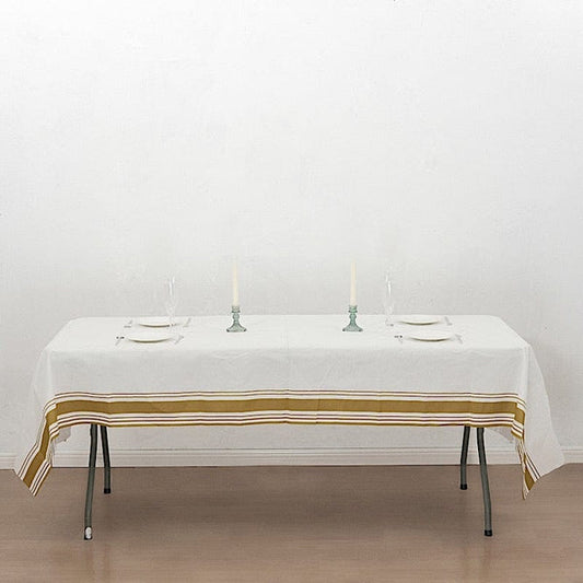 50x108 in White Airlaid Paper Rectangular Tablecloth with Gold Striped Border