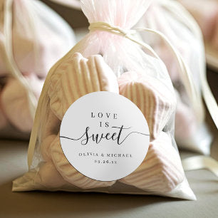 Simple elegant script love is sweet wedding favor classic round sticker