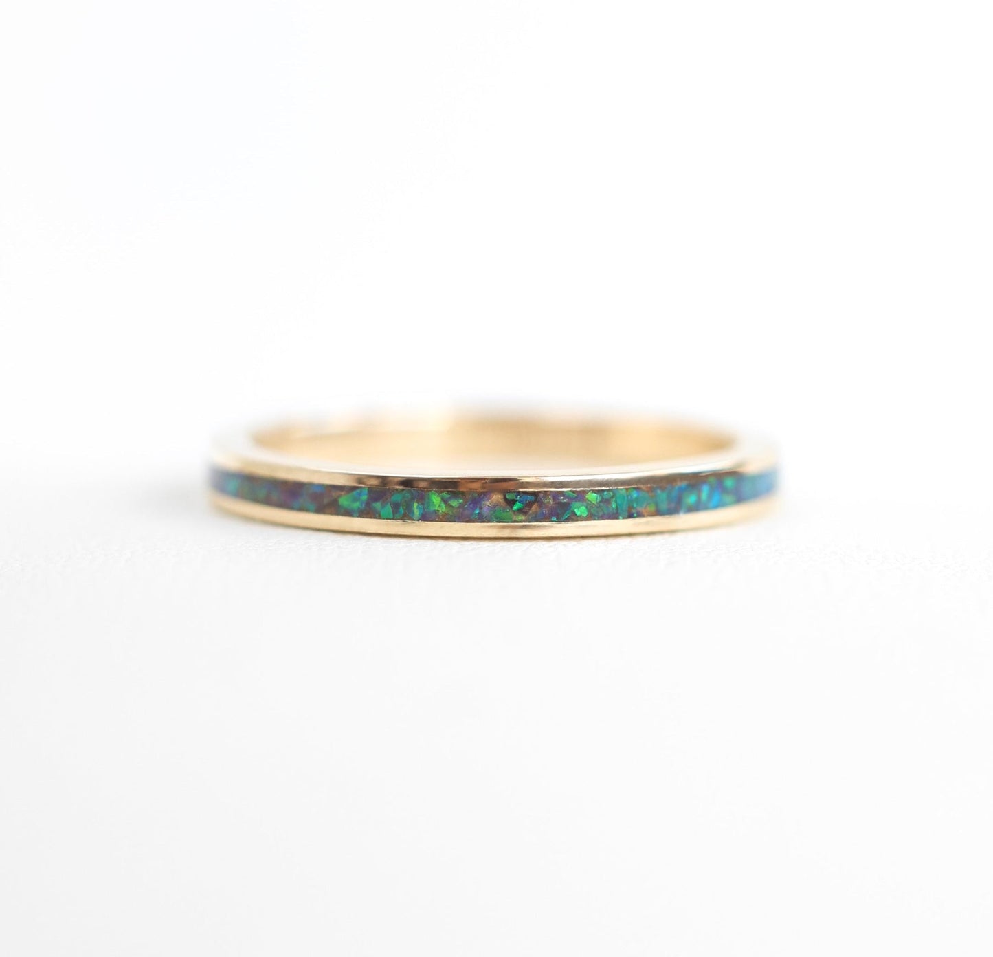 Delicate lab opal inlay ring