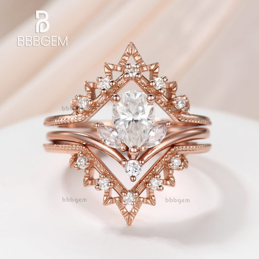 Floral Pear Cut Moissanite Engagement Ring Set 3 Pieces with V-Shaped Diamond Beaded Band in Rose Gold