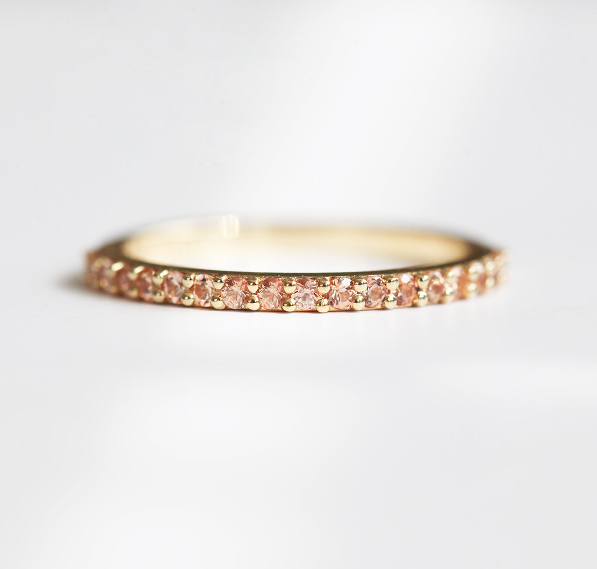 Full Eternity Peach Sapphire Ring