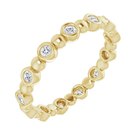 3.214K Yellow Gold 1/4 CTW Diamond Bezel Set Eternity Band