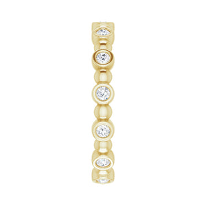 3.214K Yellow Gold 1/4 CTW Diamond Bezel Set Eternity Band